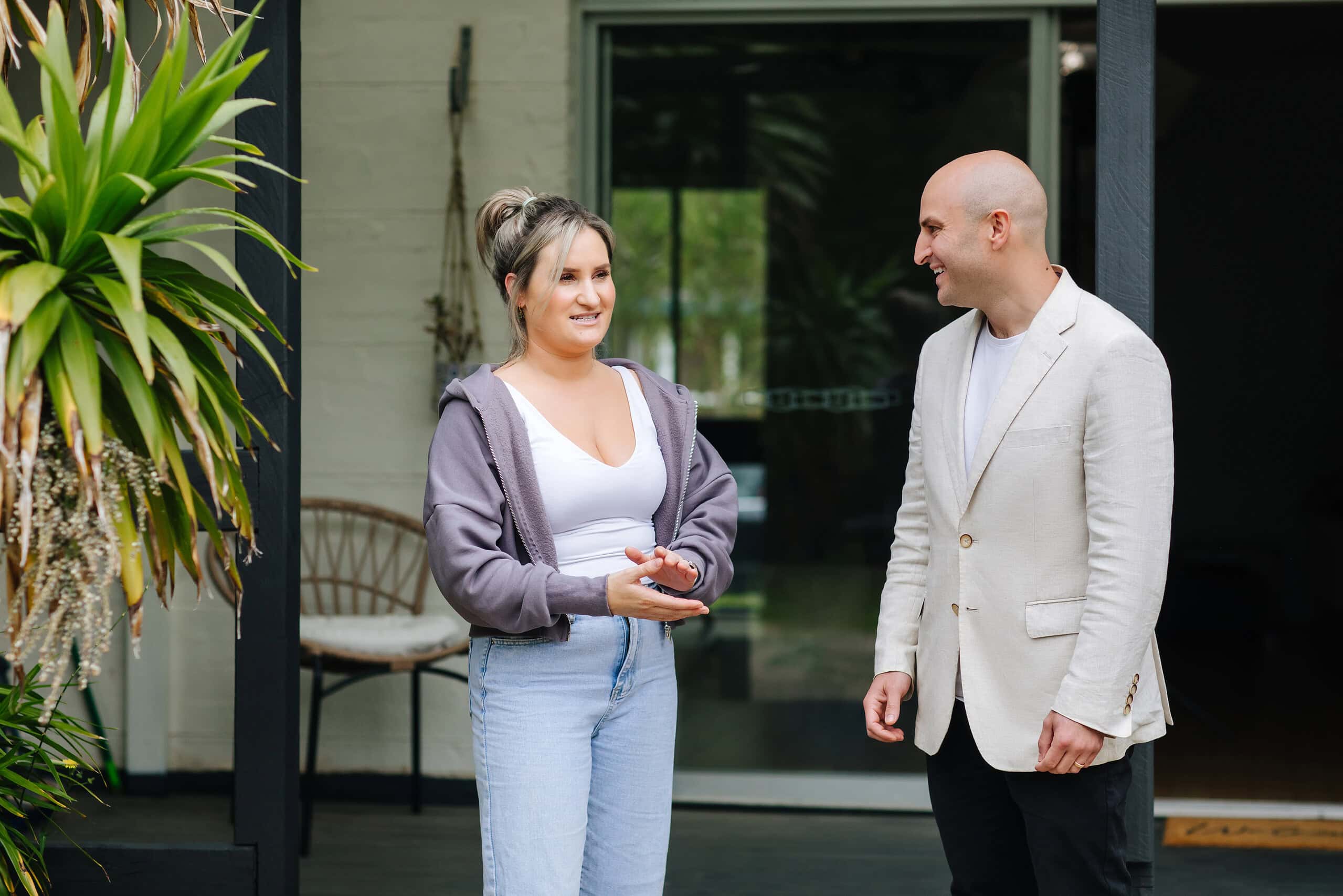 Friendly real estate agents chatting outdoors at Ember Estate Agents, providing expert property advice and service for buyers and sellers in Australia.